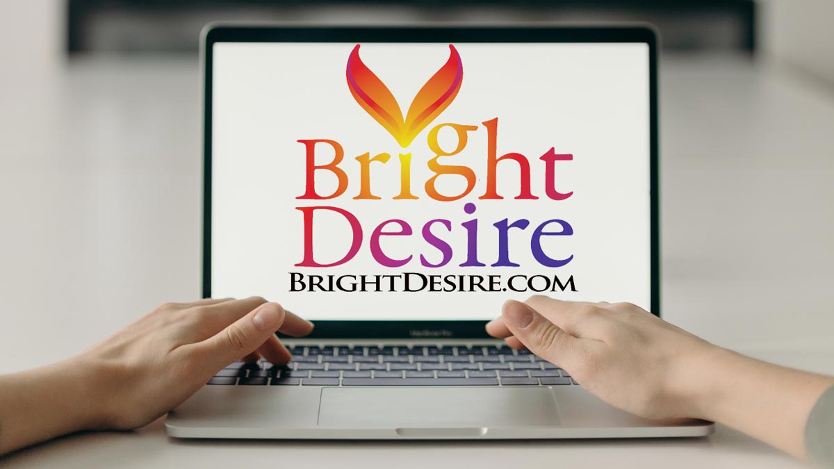 Hands typing on a laptop and the screen says: Bright Desire Newsletter