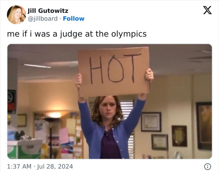 Me if I was a judge at the Olympics - woman holding up a sign that says "HOT"