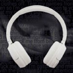 Audio porn - headphones over erotic fiction text